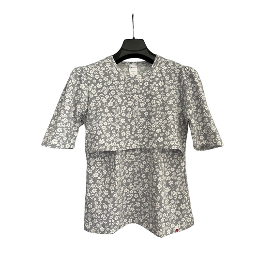 Gray floral breastfeeding nursing top with discreet double-layer nursing access, relaxed mid-length sleeves, and soft breathable fabric.